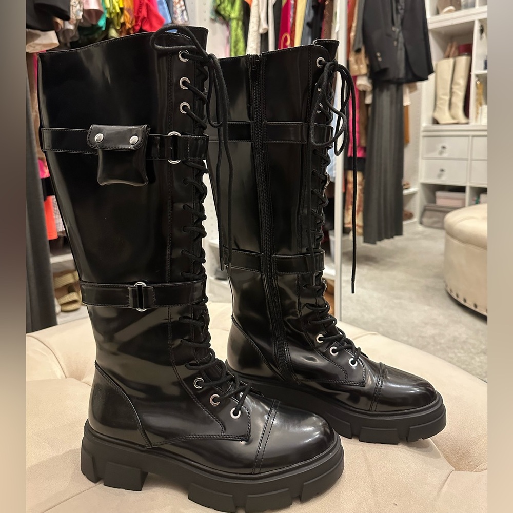 NWT. ALDO Black Patent Leather lug Boots, (just like on the Chanel AD). Size 7